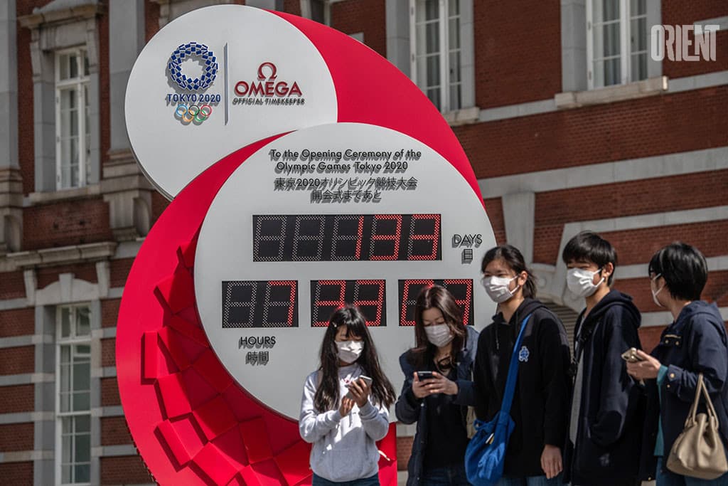 the-olympic-flame-began-a-journey-through-the-japanese-capital