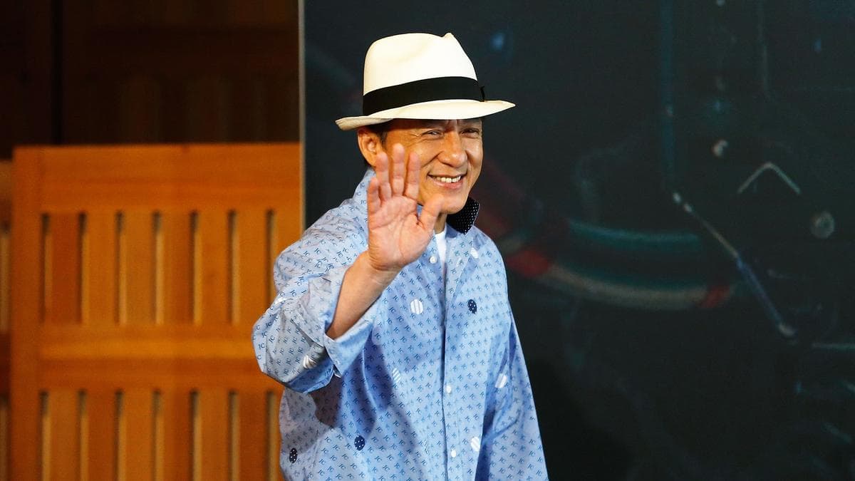 actor-jackie-chan-carry-torch-paris-paralympic-games-opening