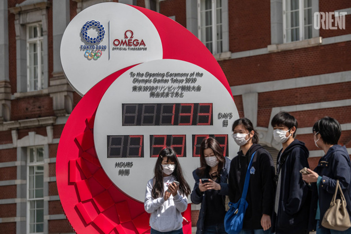  The Olympic flame began a journey through the Japanese capital