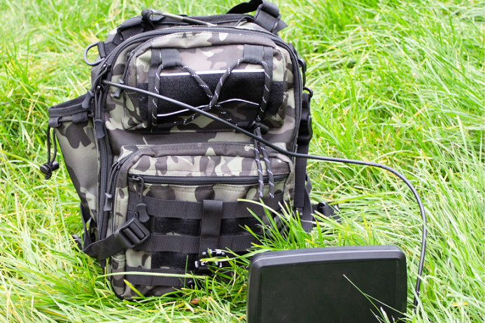  Satellite communications in a backpack: a portable terminal for personal communications is presented