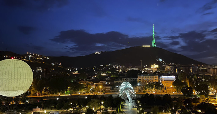  Tbilisi TV tower illuminated in the colours of the Turkmen flag in honour of the holiday